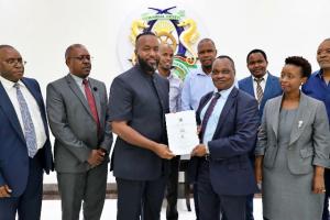 PROF.MBECHE WITH GOVERNOR JOHO